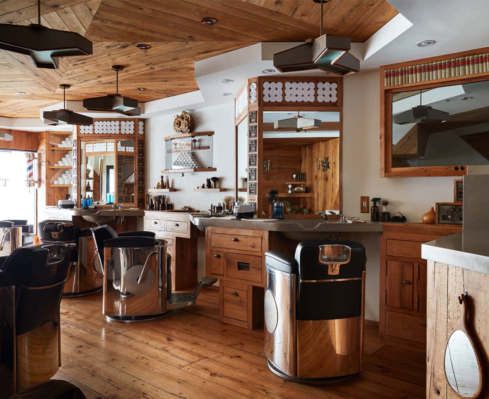 Traditional barber shop interior in West Village, Manhattan at The Kinsman — top-rated barber in New York for haircut, beard trim, skin fade and straight razor shave.